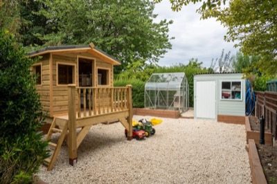 Playhouse and family garden space