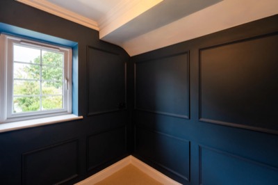 Dark panelled room
